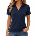 Polo femme taille M bleu marine à manches courtes col ouvert coupe ajustée