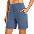 Short femme M bleu en tissu extensible taille haute avec poches